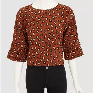 ANN TAYLOR PETITE ANIMAL DRAPED SLEEVE TOP
